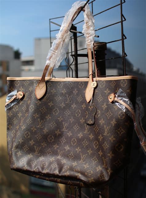 louis vuitton mm neverfull replica|louis vuitton neverfull mm empreinte.